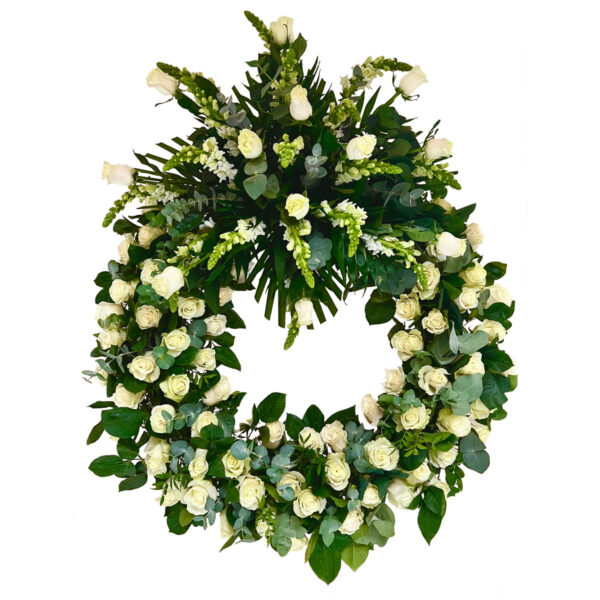 Corona funeraria de rosas blancas